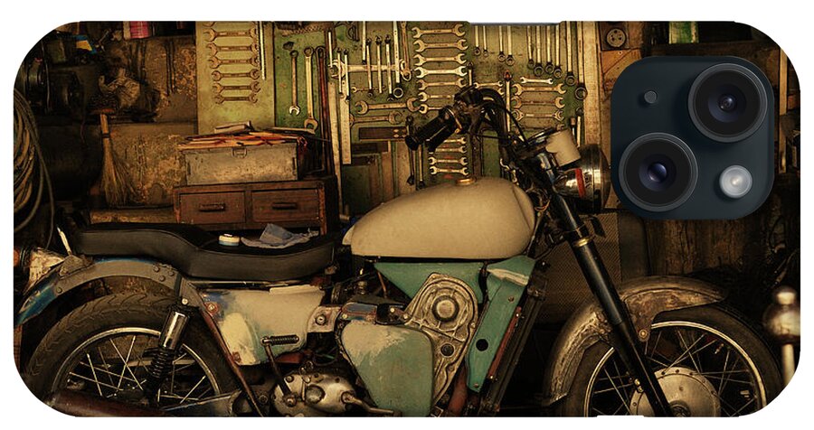 Damaged iPhone Case featuring the photograph Motorcycle In An Auto Repair Shop by Win-initiative/neleman