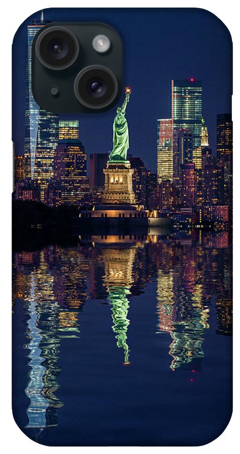 Estock iPhone Case featuring the digital art New York City, Manhattan, Lower Manhattan, Liberty Island, Statue Of Liberty, Lower Manhattan Skyline With Freedom Tower And Statue Of Liberty At Night by Antonino Bartuccio