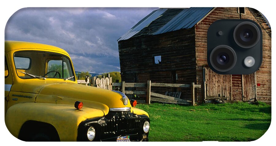 Aging Process iPhone Case featuring the photograph Old Barn And Yellow Pick-up Truck In by Lonely Planet