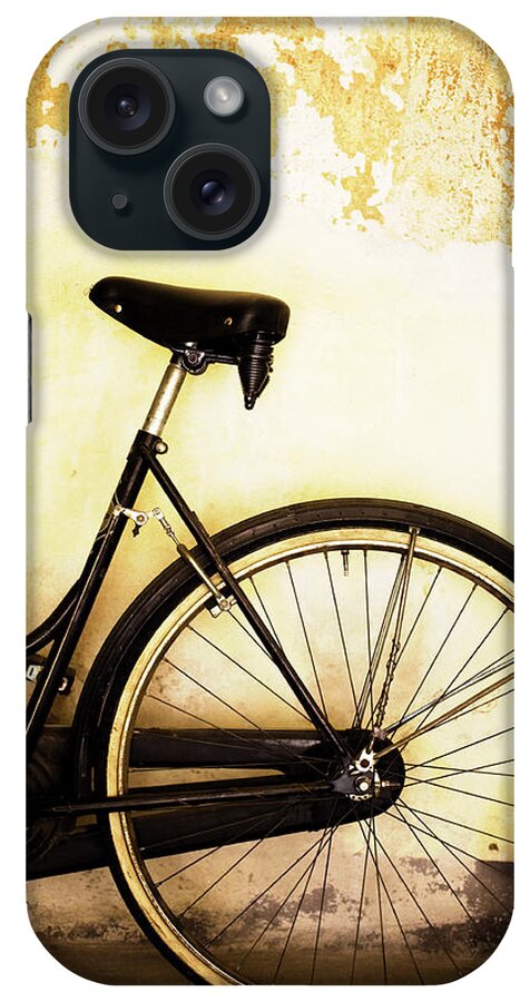 Black Color iPhone Case featuring the photograph Old Black Bicycle Wall Peeling, Vertical by Deimagine