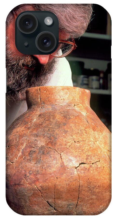 Mcgovern iPhone Case featuring the photograph Patrick Mcgovern & A Jar Which Held Ancient Wine by David Parker/science Photo Library
