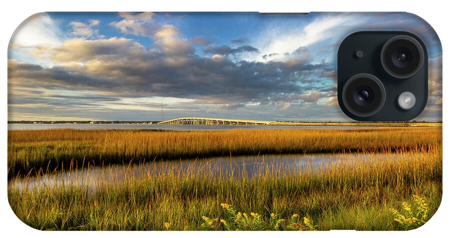 Ponquogue Bridge Shinnecock Bay Hampton Bays Long Island New York Fall Goldenrod Wetlands Bay Clouds Blue Sky Grass Reeds Reflective Reflection iPhone Case featuring the photograph Ponquogue Bridge Fall Color by Robert Seifert