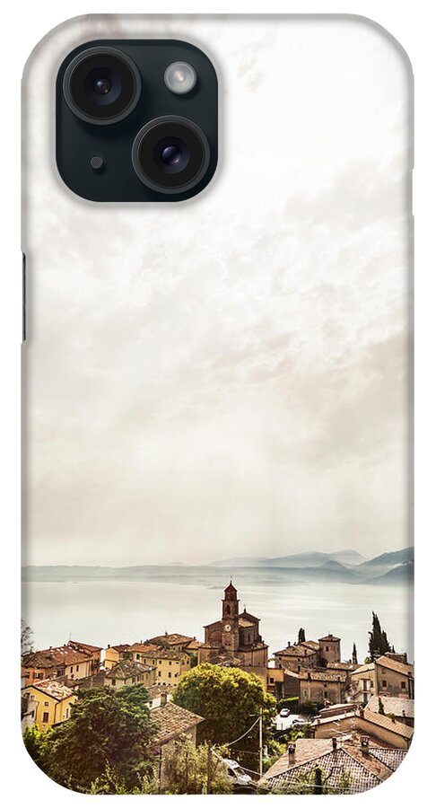 Tranquility iPhone Case featuring the photograph Rooftops Of Coastal Village by Manuel Sulzer
