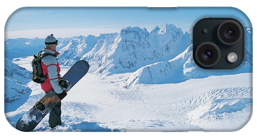 Three Quarter Length iPhone Case featuring the photograph Side View Of A Snowboarder Looking At by Digital Vision.