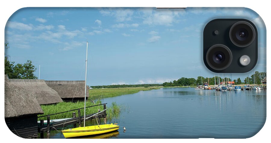 Sailboat iPhone Case featuring the photograph Small Sailboat At Old Boat House by Thomas Winz