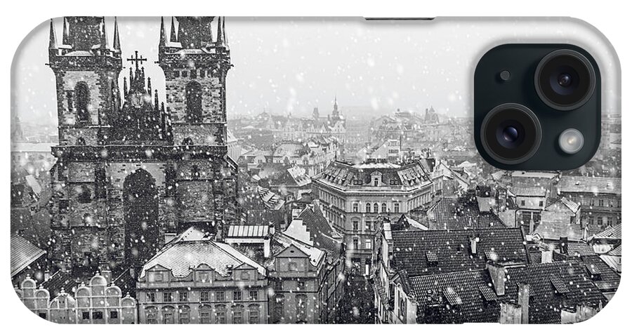 Jenny Rainbow Fine Art Photography iPhone Case featuring the photograph Snowy Christmas Prague. Church of the Virgin Mary before Tyn 1 by Jenny Rainbow