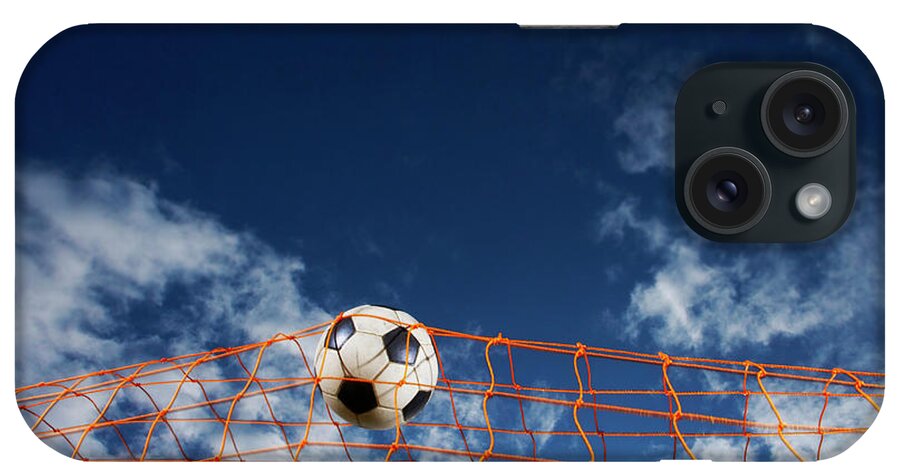 Working iPhone Case featuring the photograph Soccer Ball Going Into Goal Net by Fuse