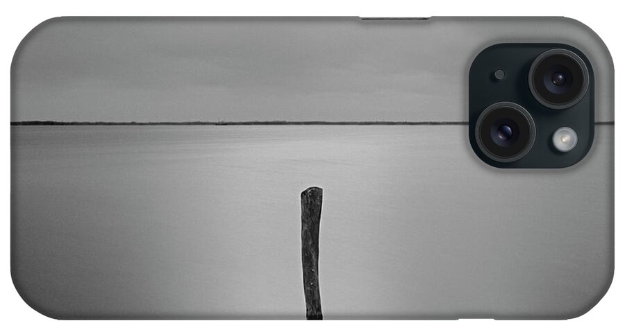 Single Pole Emerging From The Water
Photography iPhone Case featuring the photograph Solitude by Moises Levy