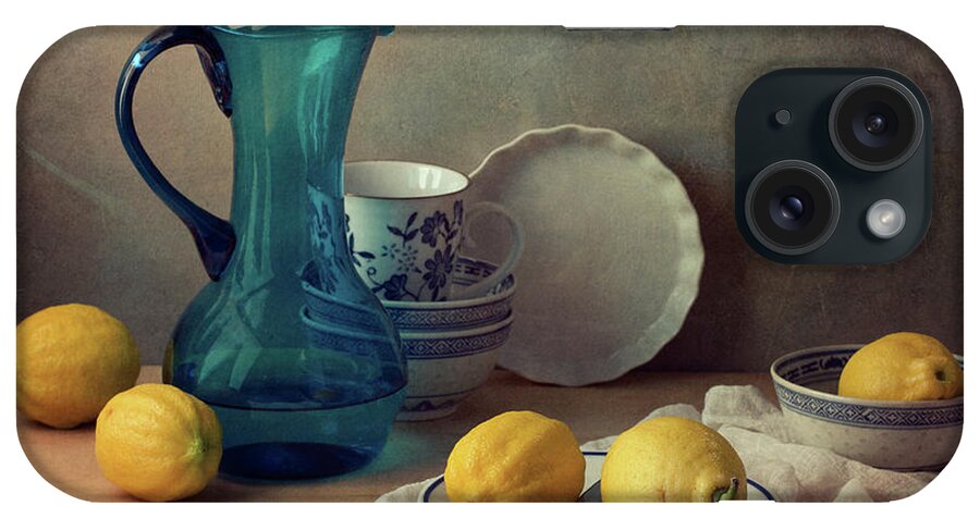 Healthy Eating iPhone Case featuring the photograph Still Life With Lemons And Blue Glass by Copyright Anna Nemoy(xaomena)