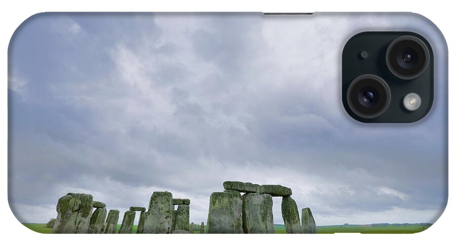 Prehistoric Era iPhone Case featuring the photograph Stonehenge And Storm Clouds by John Wang