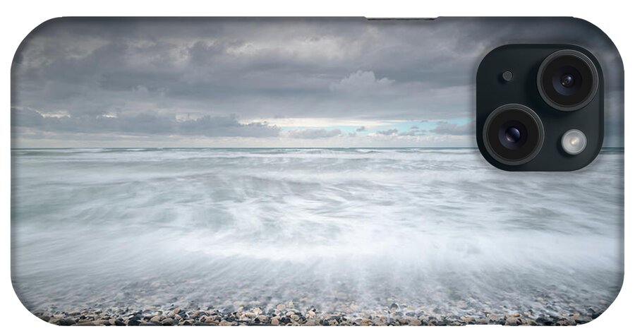 Coast iPhone Case featuring the photograph Stormy Sky and Wavy ocean by Michalakis Ppalis