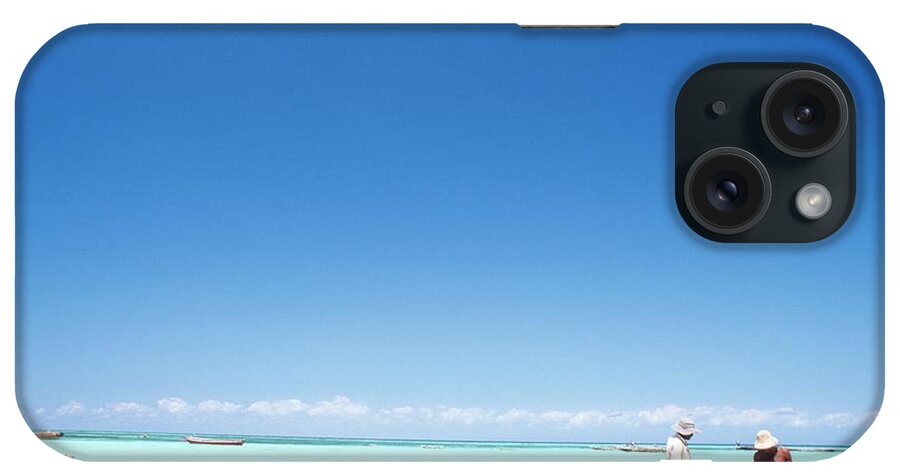 Kenya iPhone Case featuring the photograph Three Men Pulling Dugout Canoe To Shore by Anton Robert