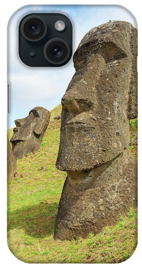 Tranquility iPhone Case featuring the photograph Three Moai Half Buried In A Quarry by Volanthevist