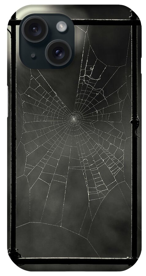 Spider Web In A Window iPhone Case featuring the photograph Tinier Furniture by Geoffrey Ansel Agrons