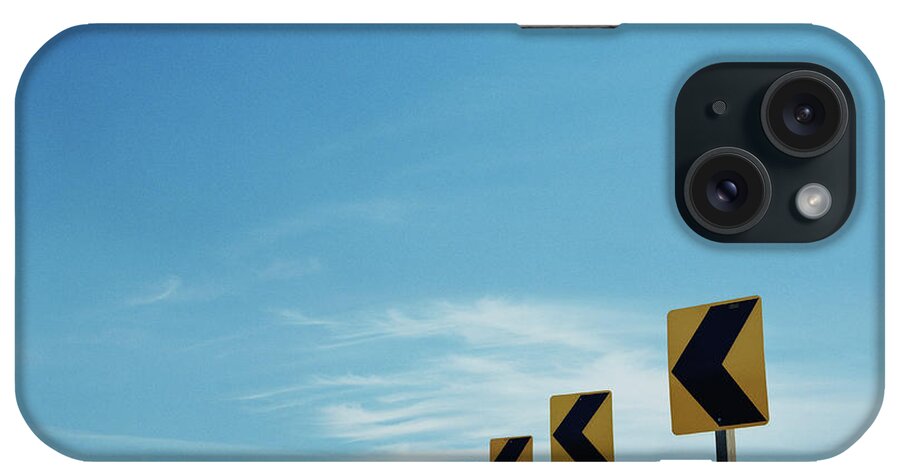 Curve iPhone Case featuring the photograph Traffic Arrows Around Bend In Round by Pete Starman