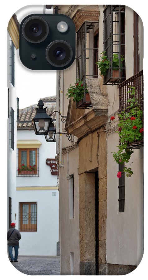 People iPhone Case featuring the photograph Vertical View Od Cordoba Street by Izzet Keribar