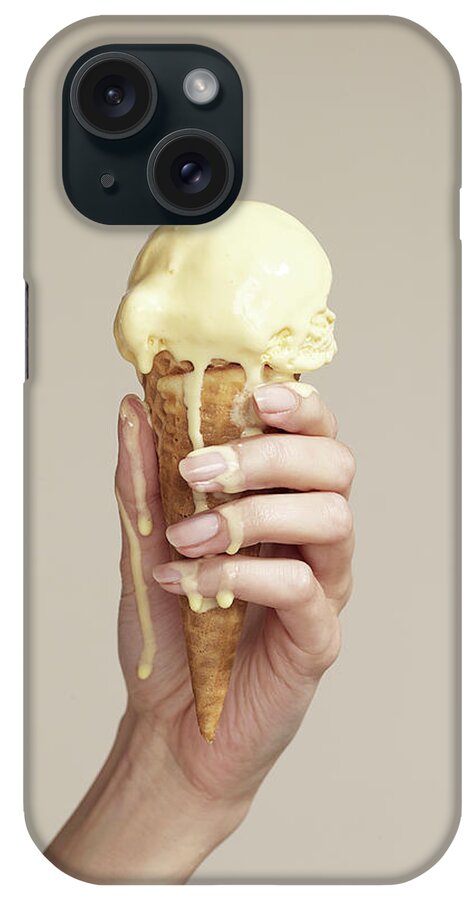 Melting iPhone Case featuring the photograph Woman Holding Melting Ice Cream Cone by Walker And Walker