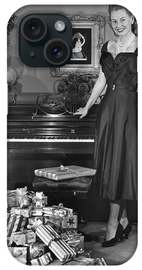 Piano iPhone Case featuring the photograph Woman Standing By Piano & Presents by George Marks