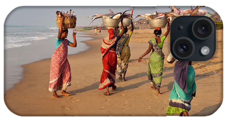Water's Edge iPhone Case featuring the photograph Women Carrying Fish From Market by Richard I'anson