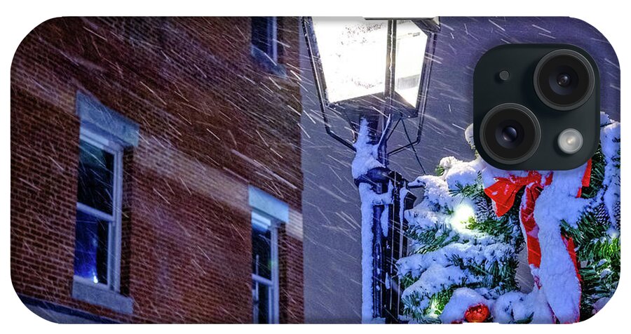 Blowing Snow iPhone Case featuring the photograph Wreath On A Lamp Post by Jeff Sinon