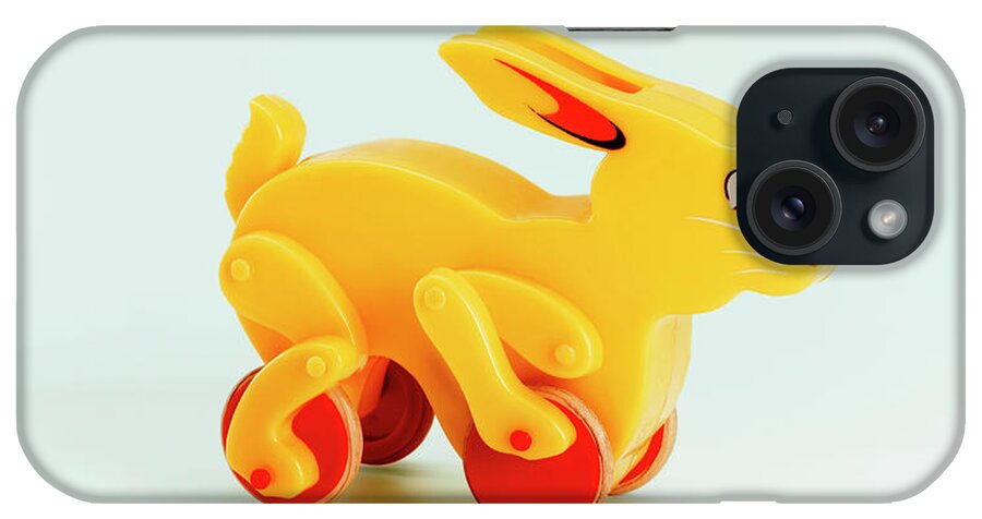 Animal iPhone Case featuring the drawing Yellow Rabbit Toy on Wheels by CSA Images