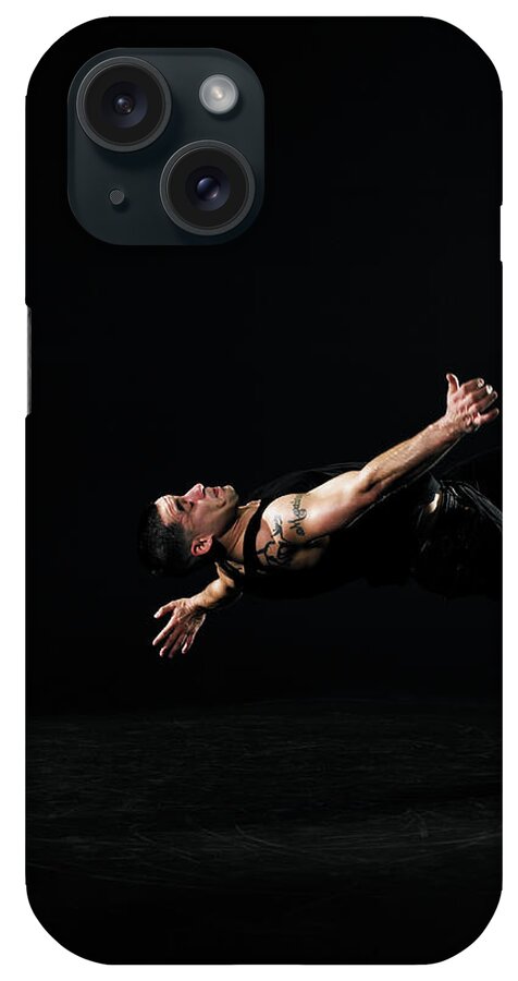 Human Arm iPhone Case featuring the photograph Young Man Breakdancing, Side View by Thomas Barwick