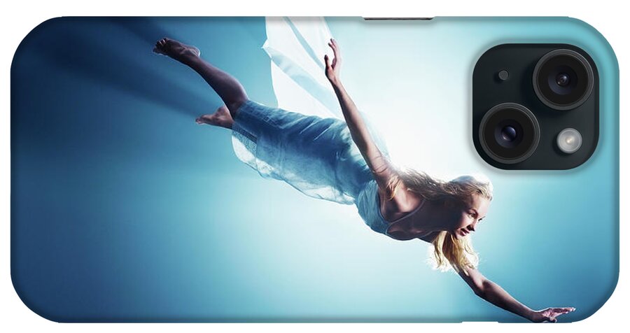 Human Arm iPhone Case featuring the photograph Young Woman In Air, Low Angle View by Henrik Sorensen