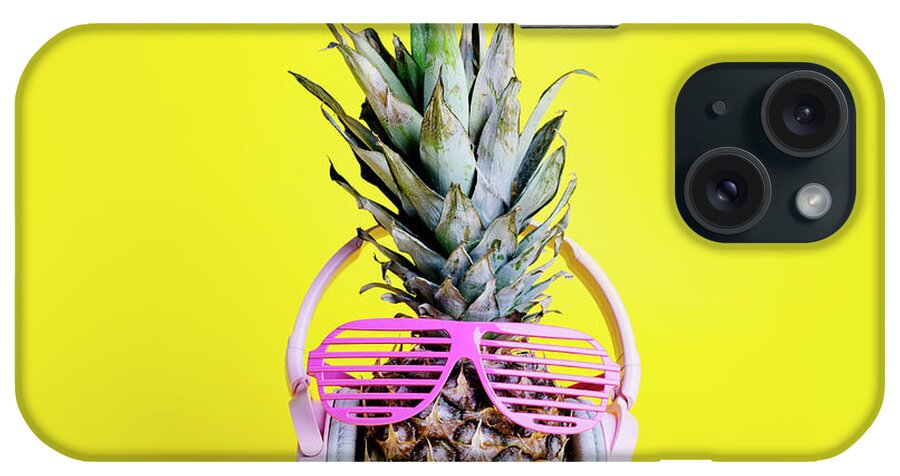 Pineapple iPhone Case featuring the photograph Fashionable trendy pineapple fruit with headphones and sun glas #1 by Jelena Jovanovic
