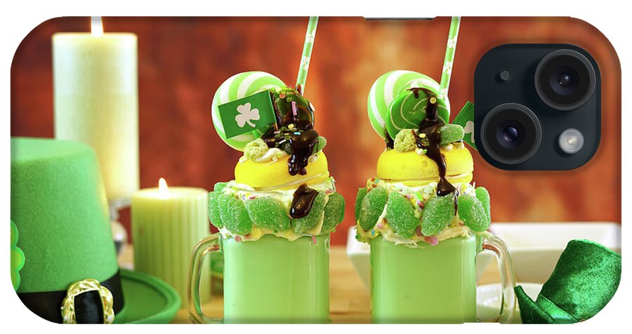 St Patricks Day iPhone Case featuring the photograph St Patrick's Day on-trend holiday freak shakes with candy and lollipops. #2 by Milleflore Images