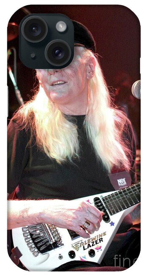 Guitarist Johnny Winter Is Shown Performing On Stage During A Live Concert Appearance. iPhone Case featuring the photograph Johnny WInter #6 by Concert Photos