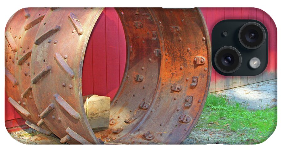 Antique Metal Tractor Wheels By Norma Appleton iPhone Case featuring the photograph Antique Metal Tractor Wheels by Norma Appleton