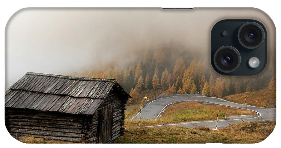 Passo Gardena iPhone Case featuring the photograph Autumn landscape with wooden chalet dolomiti Italian Apls by Michalakis Ppalis