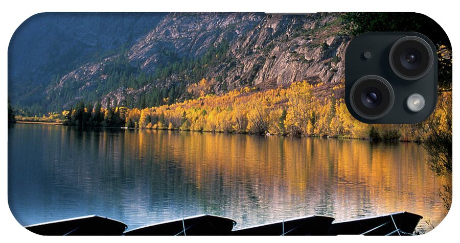 Four iPhone Case featuring the photograph Boat Silhouettes on Silver Lake, Dawn in Autumn by Bonnie Colgan