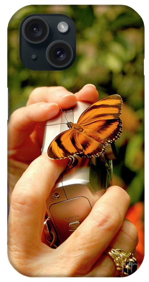 Hand iPhone Case featuring the photograph Butterfly lands on the persons camera by Gunther Allen