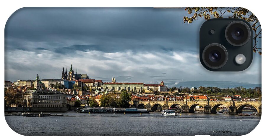 Prague iPhone Case featuring the photograph Charles Bridge Over Moldova River And Hradcany Castle In Prague In The Czech Republic by Andreas Berthold