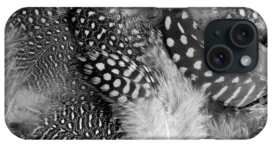 Feathers iPhone Case featuring the photograph Closeup Of The Grey Feather Background by Severija Kirilovaite