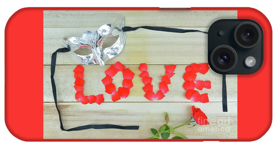 Concept With Mask Word Love Written With Rose Petals And A Red