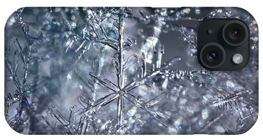 Beautiful iPhone Case featuring the photograph Entangled snowflakes are shimmering in the blue light of winter by Ulrich Kunst And Bettina Scheidulin