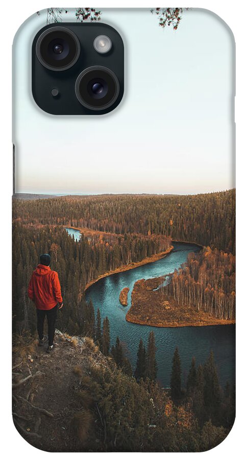 Kuusamo iPhone Case featuring the photograph Explorer looks at the blue snake, the river which is surrounded by spruce forests by Vaclav Sonnek