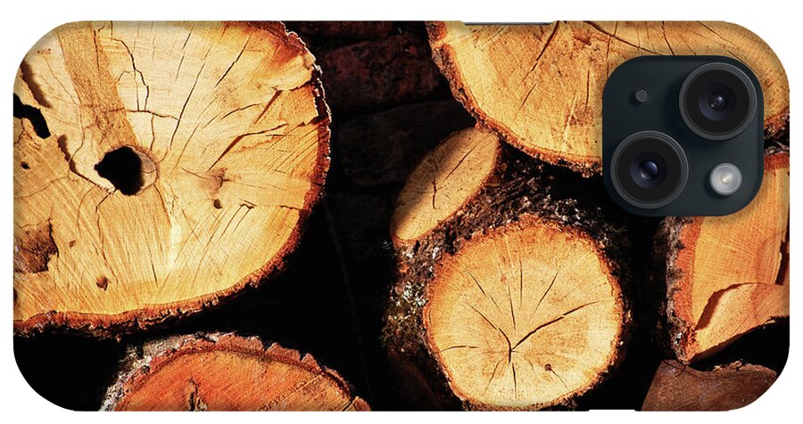 Log iPhone Case featuring the photograph Freshly cut and stacked tree logs by Mendelex Photography