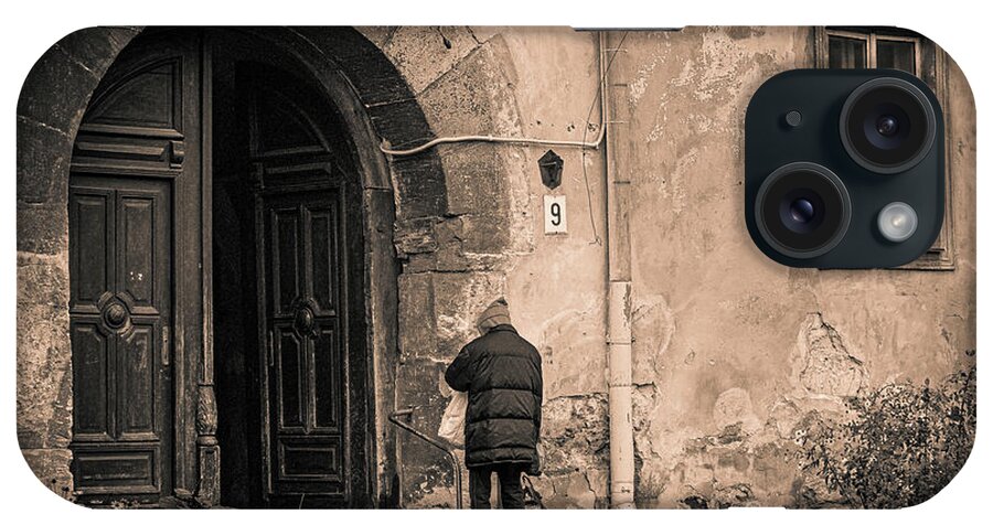 Door Shopping Home Old City Shopping Lviv Ukraine iPhone Case featuring the photograph Going Back Home After Shopping - Lviv, Ukraine by David Morehead