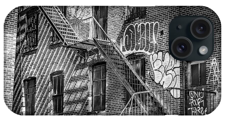 Graffiti iPhone Case featuring the photograph Graffiti and Fire Escapes by Penny Polakoff