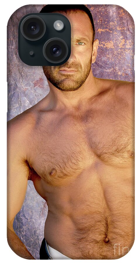 Homoerotic iPhone Case featuring the photograph Handsome and muscular man poses for a studio portrait showing that he is in great muscular body. by Gunther Allen