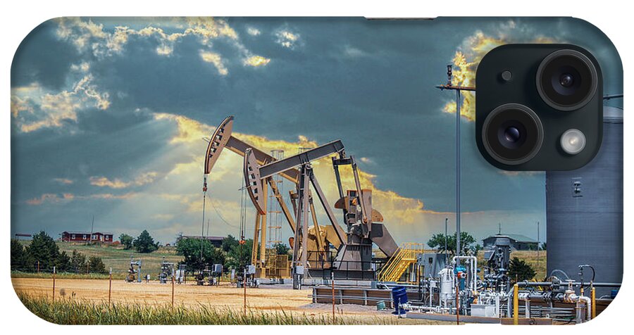 Tanks iPhone Case featuring the photograph Harvesting Oil by Susan Vineyard