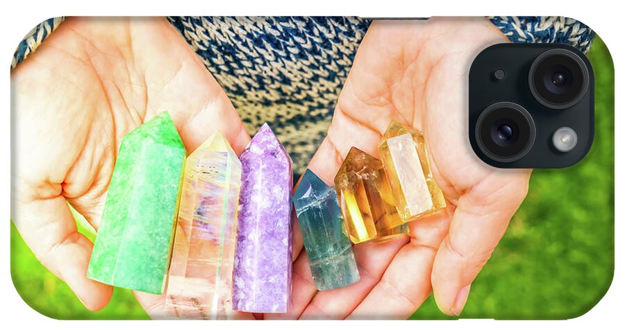 Healing Crystal iPhone Case featuring the photograph Healing Crystals in Hands by Anastasy Yarmolovich