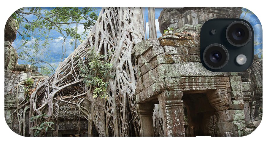Angkor iPhone Case featuring the photograph Huge tree roots engulf the ruined temple by Steve Estvanik