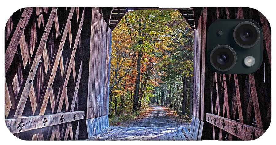 Newport iPhone Case featuring the photograph Looking out of the Pier Covered Bridge in the Fall Newport NH by Toby McGuire