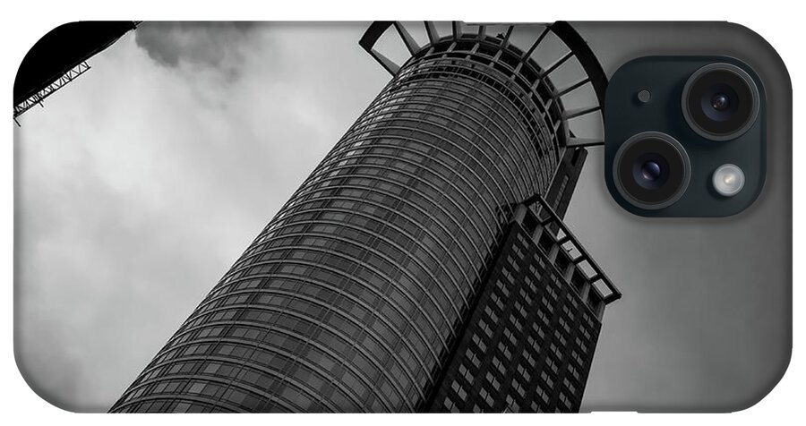 Office Building iPhone Case featuring the photograph Modern architecture design of a Skyscraper building. Black and white futuristic exterior against cloudy sky by Michalakis Ppalis