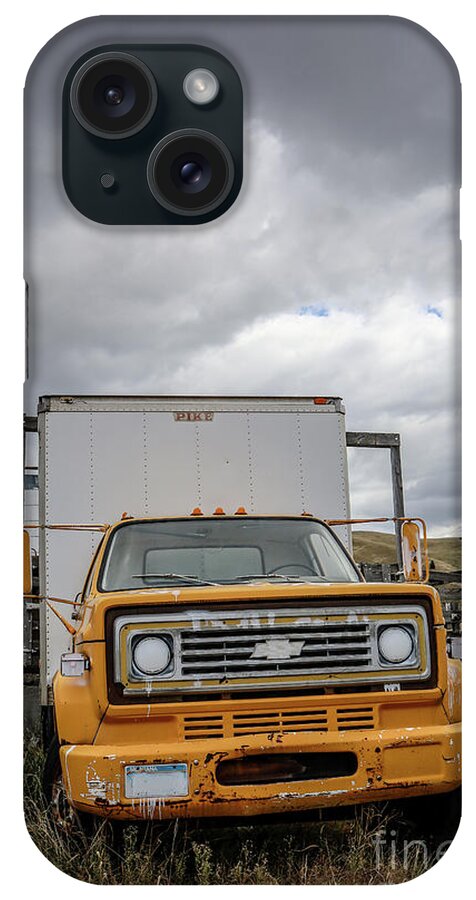 Montana iPhone Case featuring the photograph Old Truck Story Mill and Livestock Auction by Edward Fielding