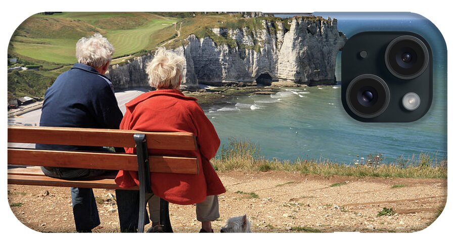 Etretat iPhone Case featuring the photograph Older couple with dog, Etretat by Bryan Attewell